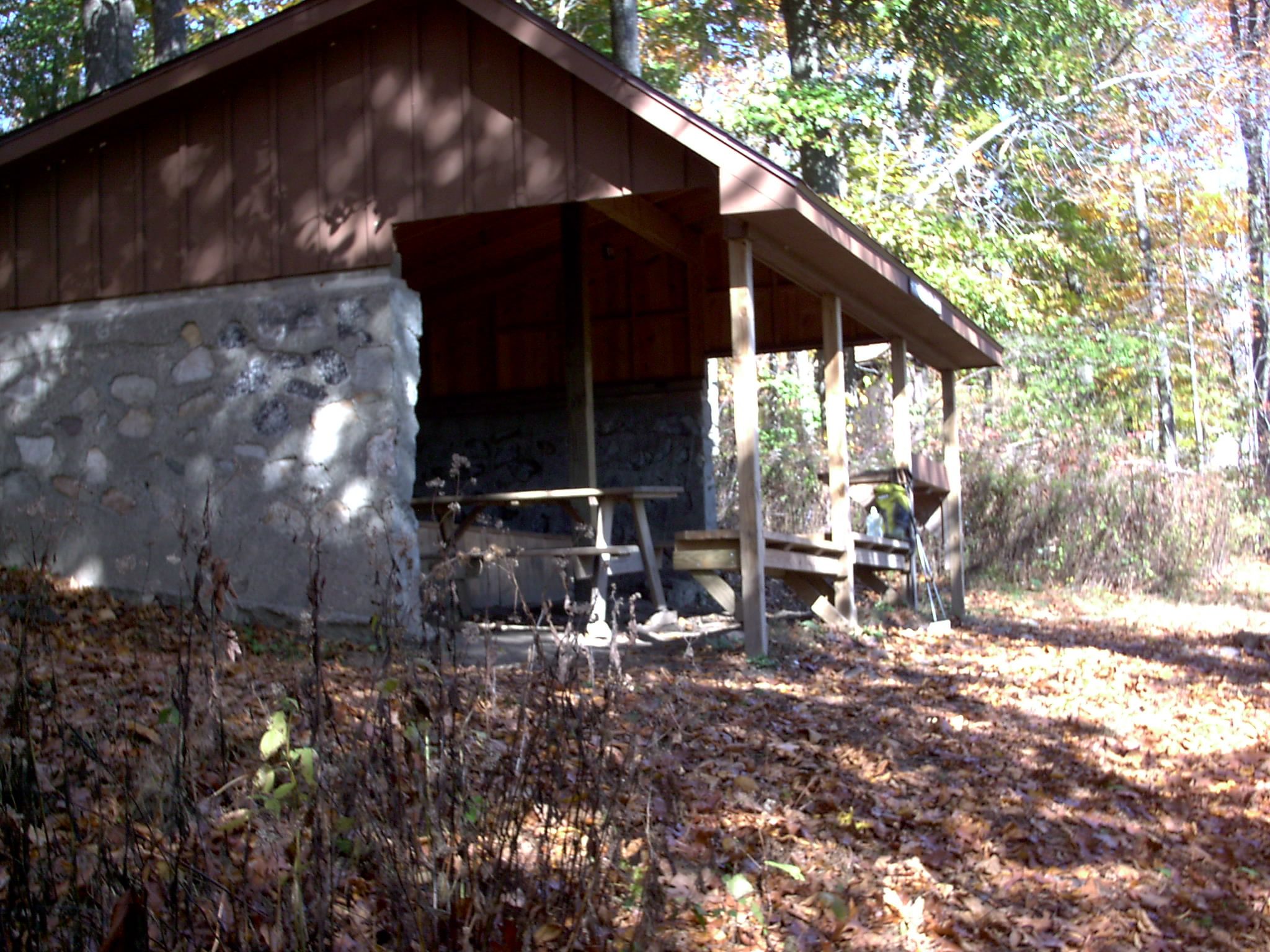 mm 6.5 - Kirkridge shelter from the northern blue-blaze trail. You can just see the composting privy beyond it in the woods.  Courtesy stewartriley@earthlink.net